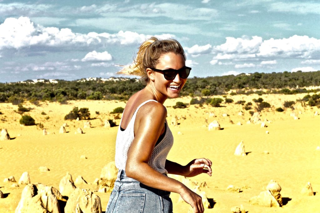 Happy young woman having fun in better times.