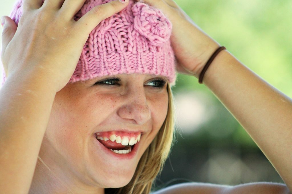 A sullen, depressed teen girl is laughing and happy because she's fighting suicide with ketamine.